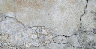 cracked concrete that needs to be repaired